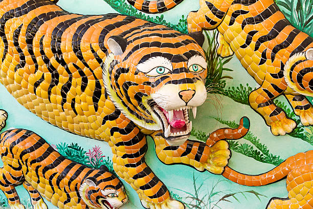 istock Tiger statue on Chinese temple wall 613221950