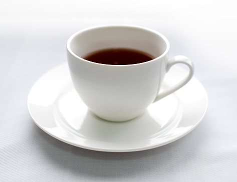 Tea cup on white background