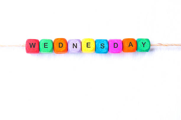 istock WEDNESDAY word of multicolored cubes 613230846