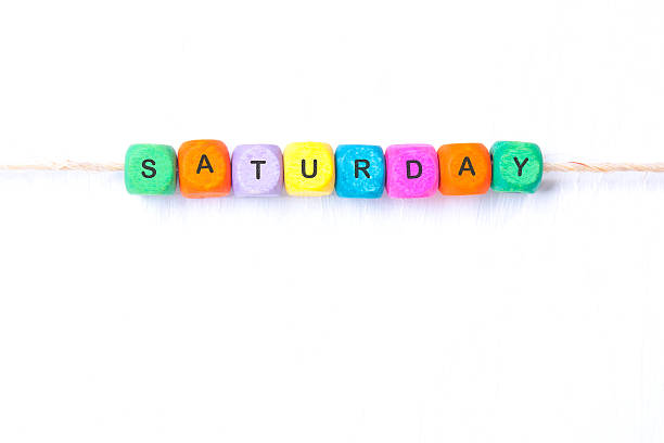 istock saturday word of multicolored cubes 613230882