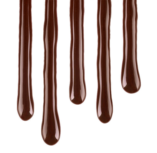 istock drips of melted chocolate closeup on white background 613230920