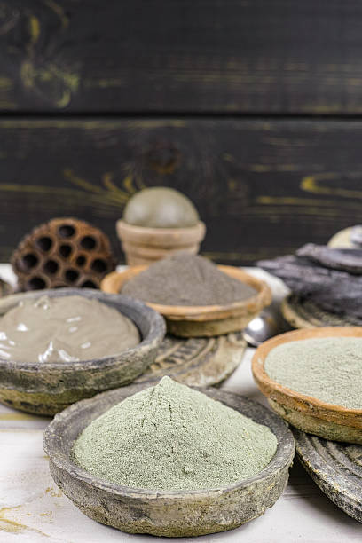 istock Ancient minerals black, green, blue clay powder and mud mask 613231458