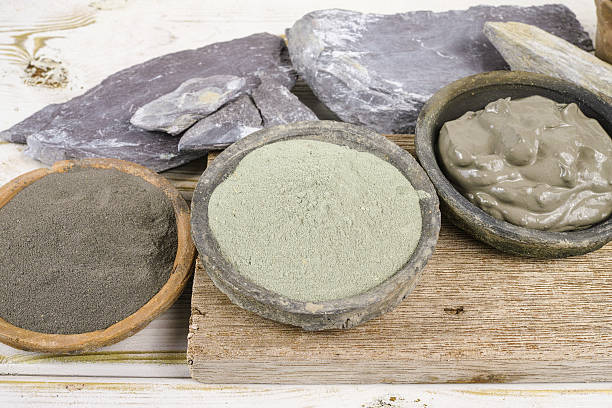 istock Ancient minerals green and blue clay powder, spa mud mask 613231578