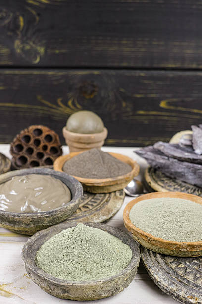 istock Ancient minerals black, green, blue clay powder and mud mask 613233076