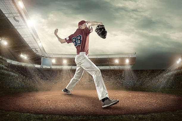istock Baseball players in action on the stadium. 613233298