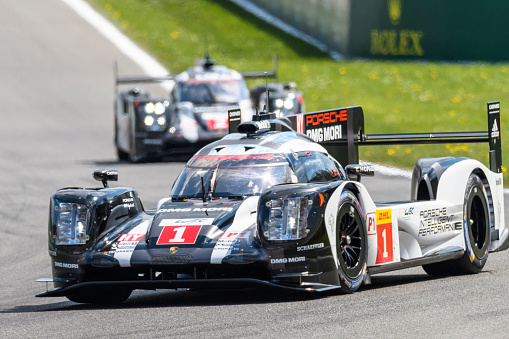 Spa, Belgium - May 7, 2016: Porsche 919 Hybrid  sports-prototype racing cars during the 2016 FIA WEC 6 Hours of Spa. The no.1 car started from pole position. The 2nd Porsche 919 is following in the background. The car is driving around the Spa Francorchamps race track during the WEC 6 Hours of Spa-Francorchamps. The team participates in the 2016 FIA World Endurance Championship (WEC).