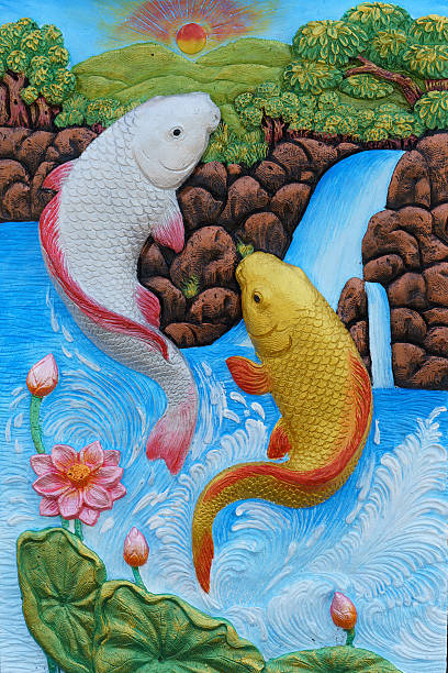 fishes and lotus Thai stucco on the wall