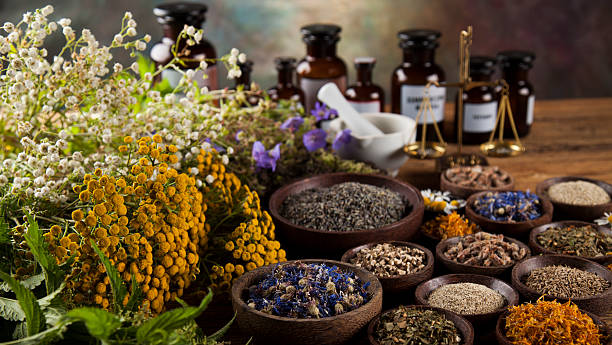 istock Herbal medicine on wooden desk background 613234580