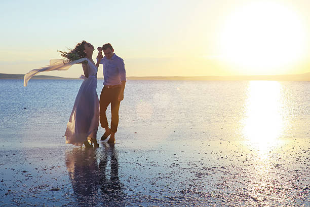 istock Newlyweds in Salt lake, Turkey 613238082