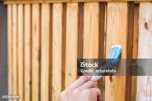 istock painting terrace railings 613240508