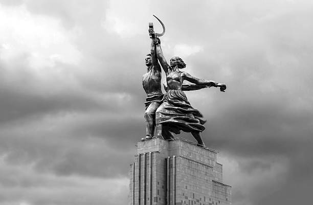 Worker and Kolkhoz Woman sculpture The sculpture of Rabochiy i Kolkhoznitsa. The sculpture was originally created to crown the Soviet pavilion of the World's Fair. former soviet union stock pictures, royalty-free photos & images