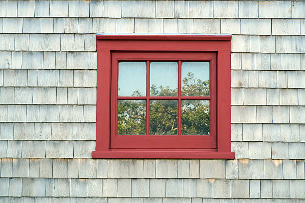 istock Wood framed window  with Eastern White Cedar shingle siding- PEI 613244048