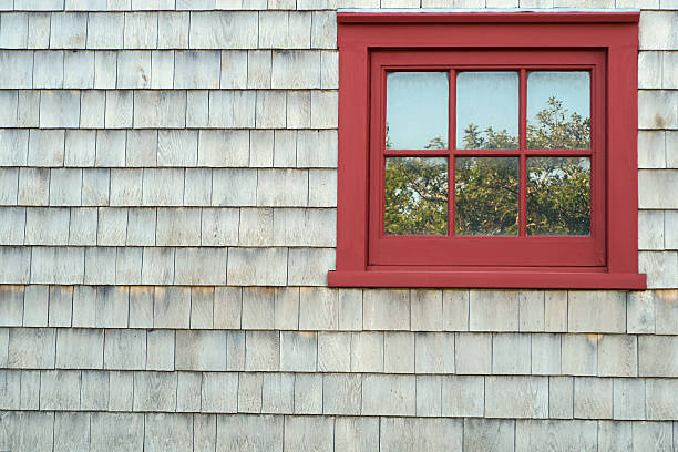 istock Wood framed window  with Eastern White Cedar shingle siding- PEI 613244164