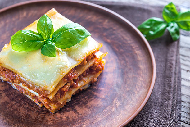 istock Portion of classic lasagne 613244596