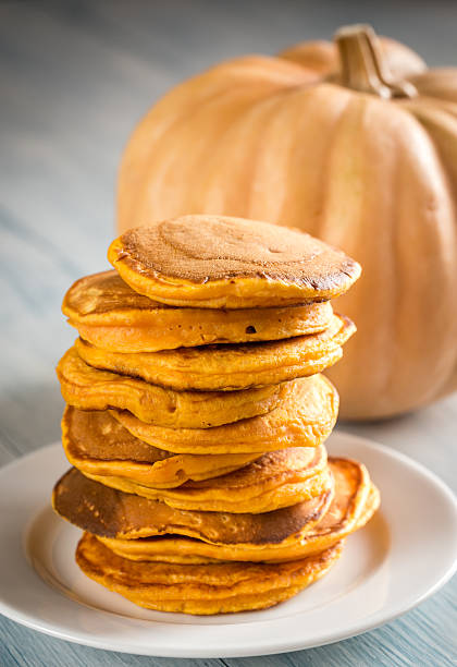 Stack of pumpkin pancakes on the plate