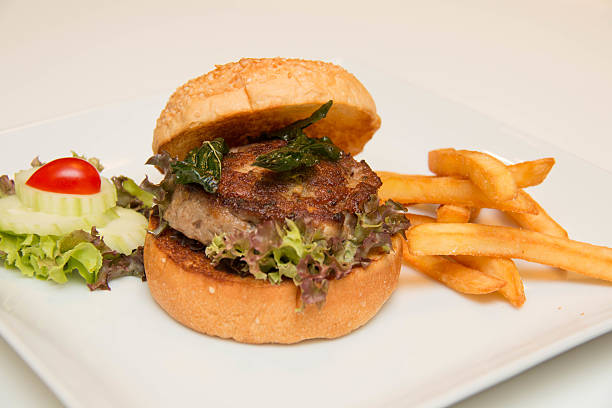 istock burger And Fries with vegetables 613248790