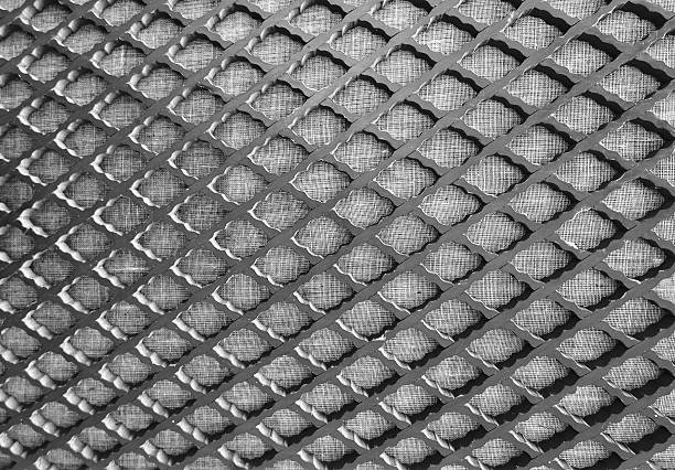 istock Close Up of Metal Grid Texture Background 613250604