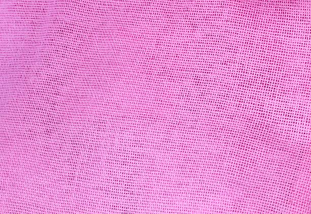 istock Pastel Background of Pink Cotton Textile Texture 613250684