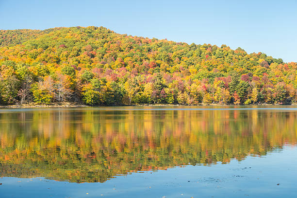 istock Hertel Lake in Quebec, Canada, with Autumn colors 613250714