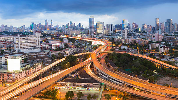 istock Bangkok city highway interchanged with office building 613250752