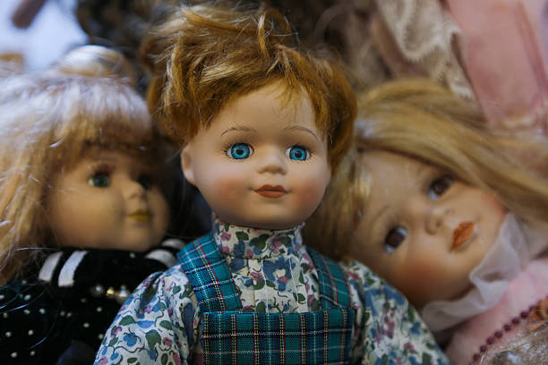 istock suitcase  , old porcelain dolls 613250808