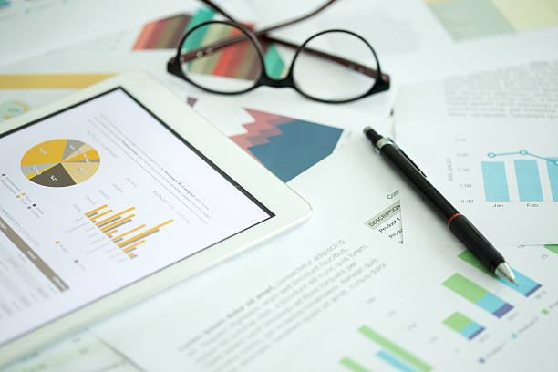 business and finance concept: business chart on desk - fähigkeit grafiken stock-fotos und bilder