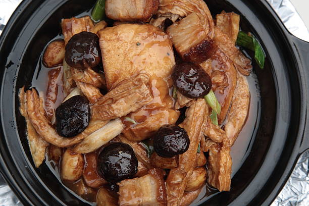Braed Bean Curd Skin, Roasted Pork, Tofu Clay Pot (Bamboo Fire Tofu Pot) stock photo