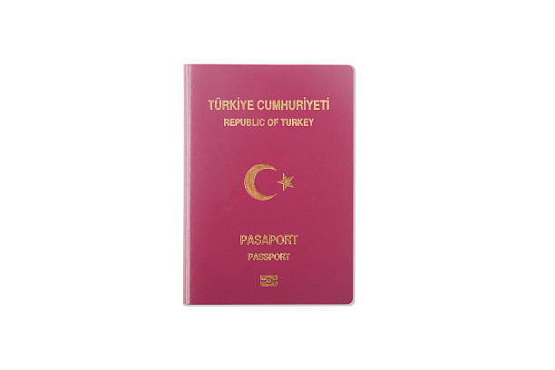 istock Turkish passport isolated on white background. 613254382