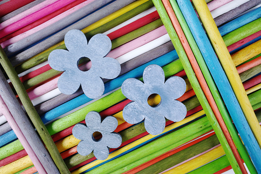 Decorative colorful wooden sticks on white background