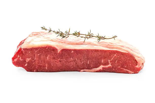 Beef rumpsteak with thyme branch, isolated