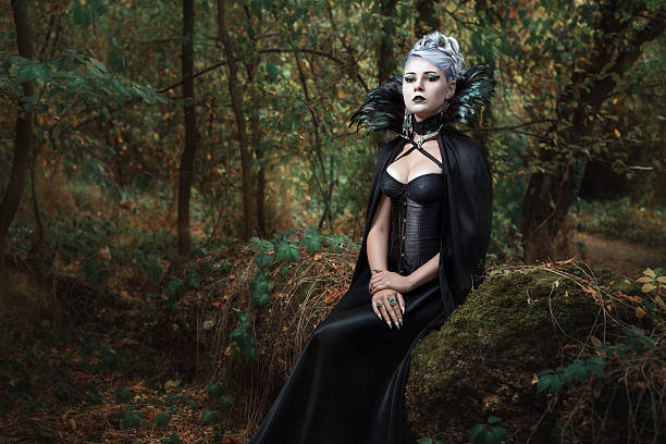 istock Gothic girl in the forest. 613304090