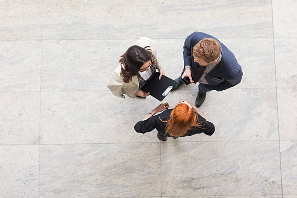 Business team discussing about work shot from above