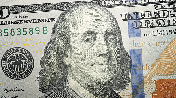 istock close up of 100 dollars 613309510