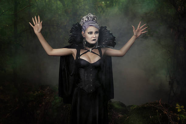 istock Girl scared in the woods with his hands. 613309754
