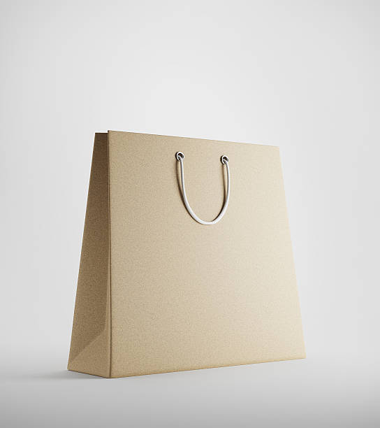istock Beige shopping bag against white background 613309832