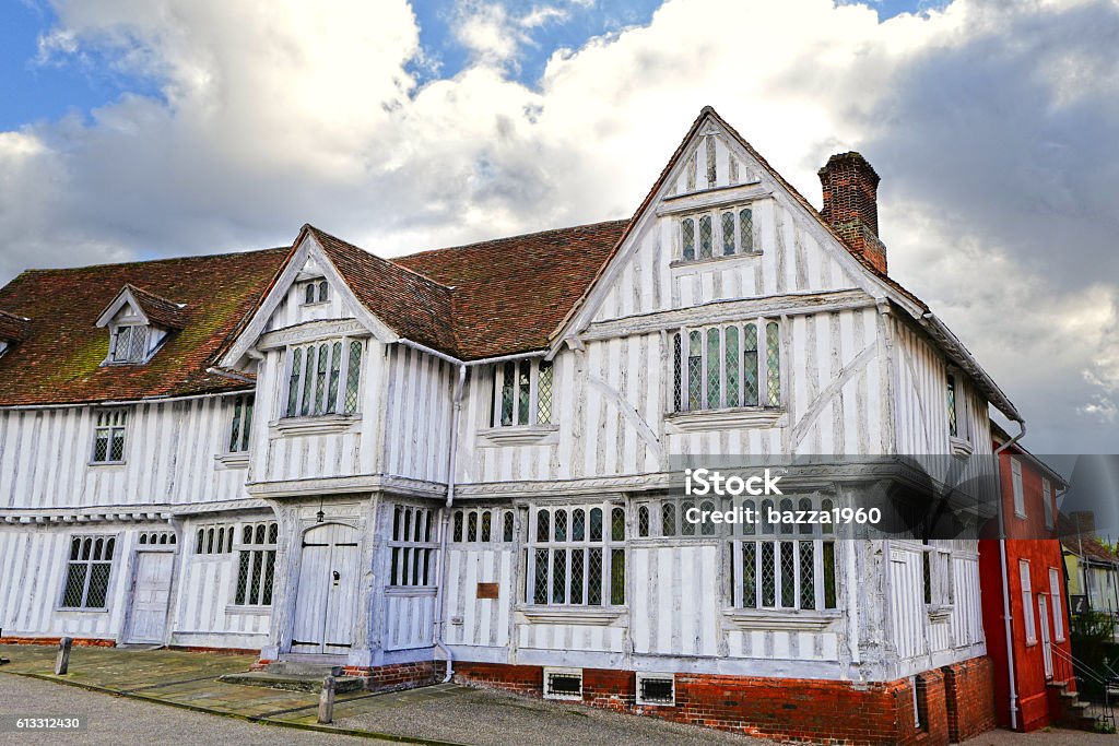 Lavenham Guildhall Lavenham Guildhall is a 16th-century timber-framed building in one of England's finest Tudor villages - Lavenham, Suffolk. Architectural Feature Stock Photo