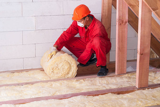 mineral wool packing working insulates the attic with mineral wool insulation stock pictures, royalty-free photos & images