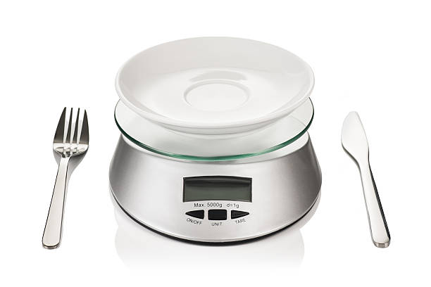 istock Kitchen weight or scale isolated on white background. 613312826