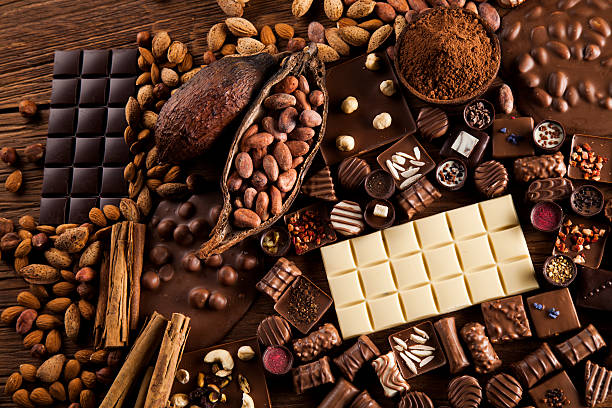 istock Praline Chocolate on wooden backgroud 613314674