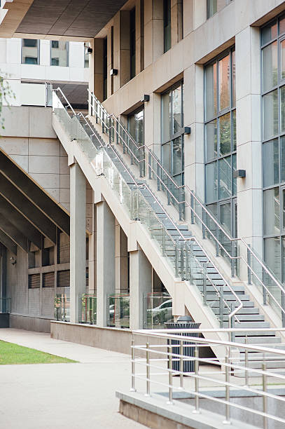 istock The modern metal stair at office building 613315042