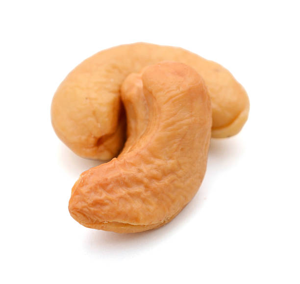 istock Two cashew in closeup 613315508