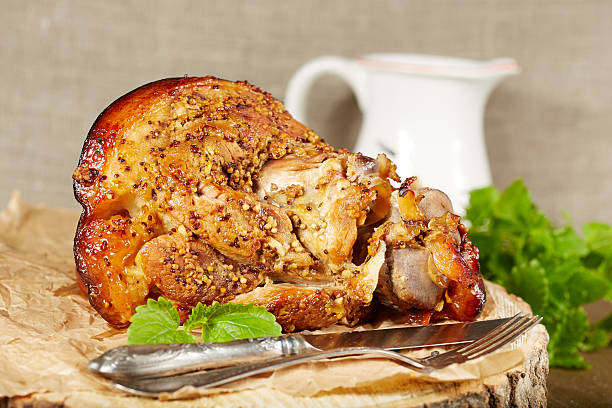 istock Pork leg roasted with mustard 613317432
