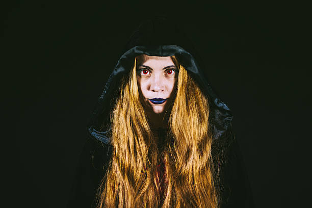 istock Red-eyed Witch Portrait 613318878