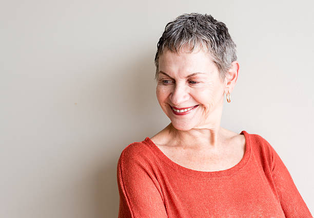 istock Older woman smiling 613319798