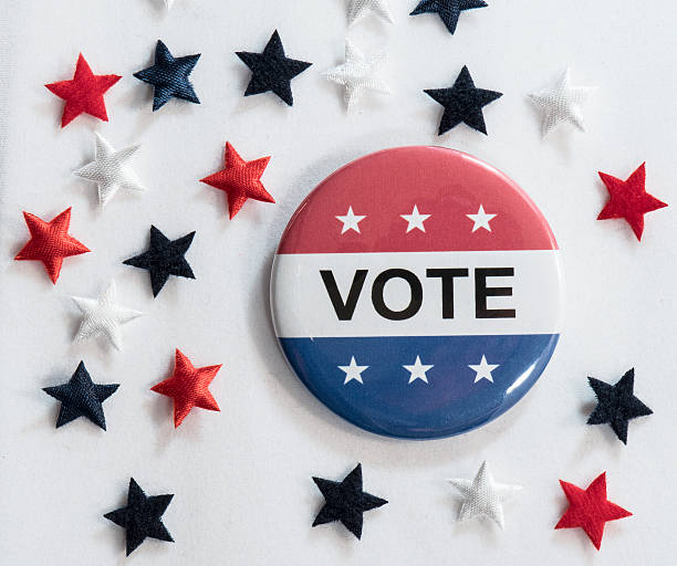 istock Vote button with red, white and blue stars 613319912