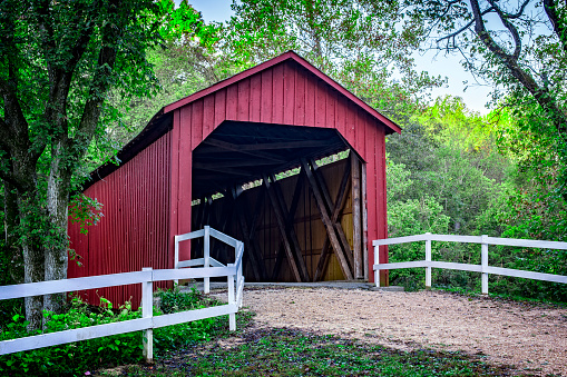 An early morning, Autumn view of the Sandy Creek Covered Bridge State Historic Site in Goldman, Missouri