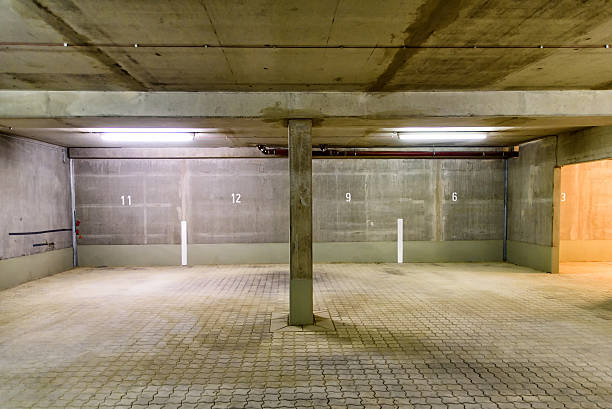 istock parking lots in an underground car park 613322868