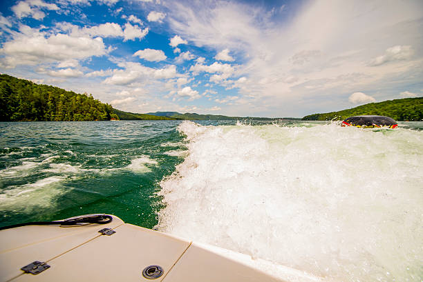 istock boating on a lake in the mountains 613327296