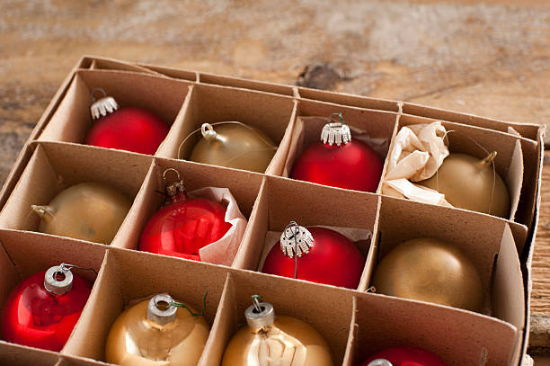istock Golden and red colored christmas ornaments 613327978