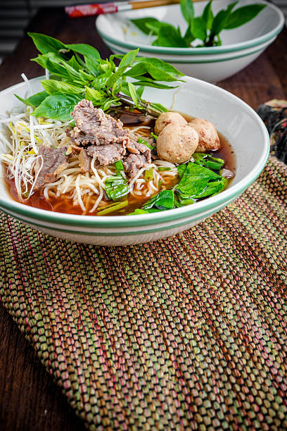 istock asian noodle soup with beef meatball with fresh vegetable 613328538